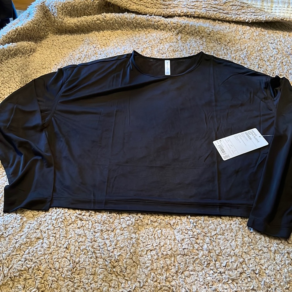 Athleta cropped type black top.